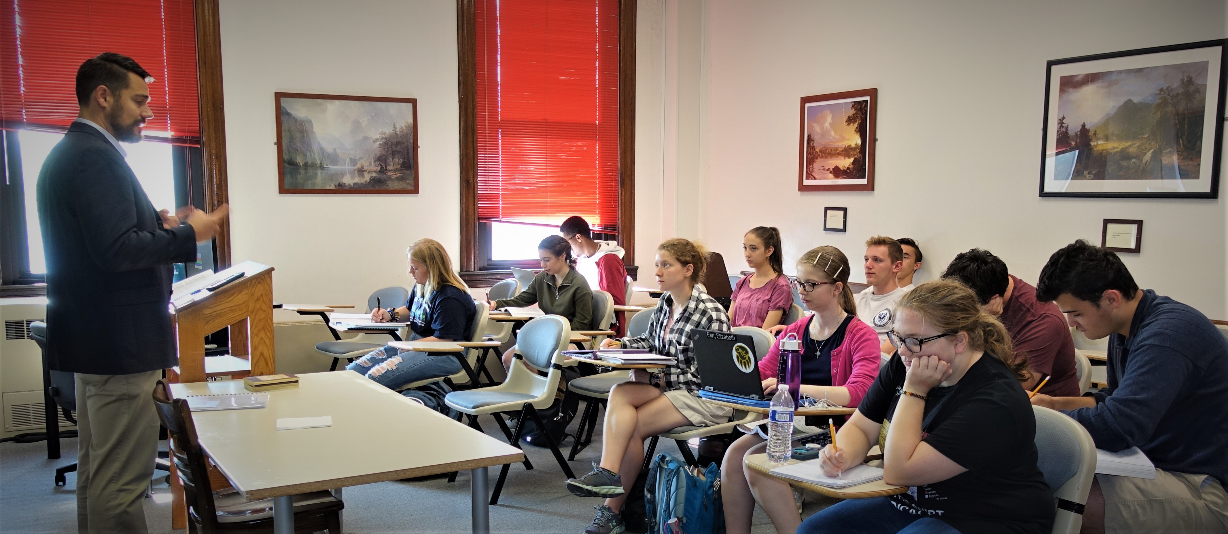 Dr. Jerome Foss teaching students in the Benedictine Leadership Studies program