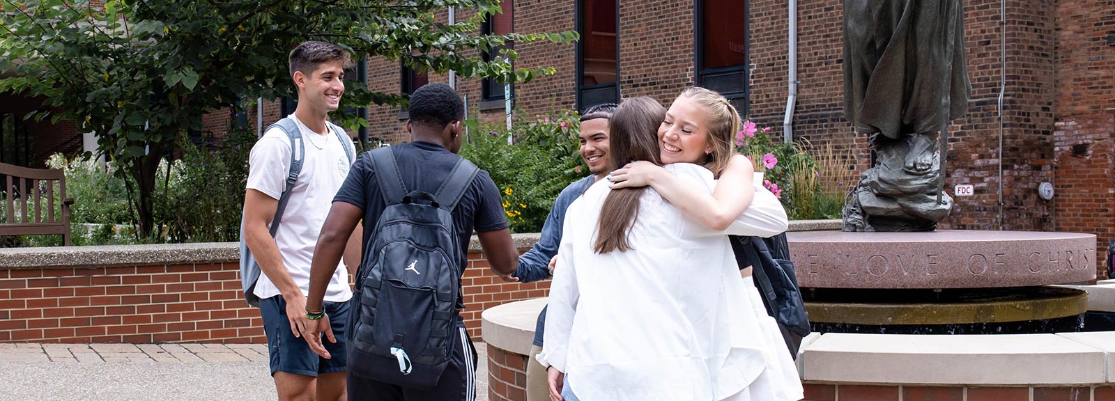 Students welcoming each other on the Saint Vincent Campus