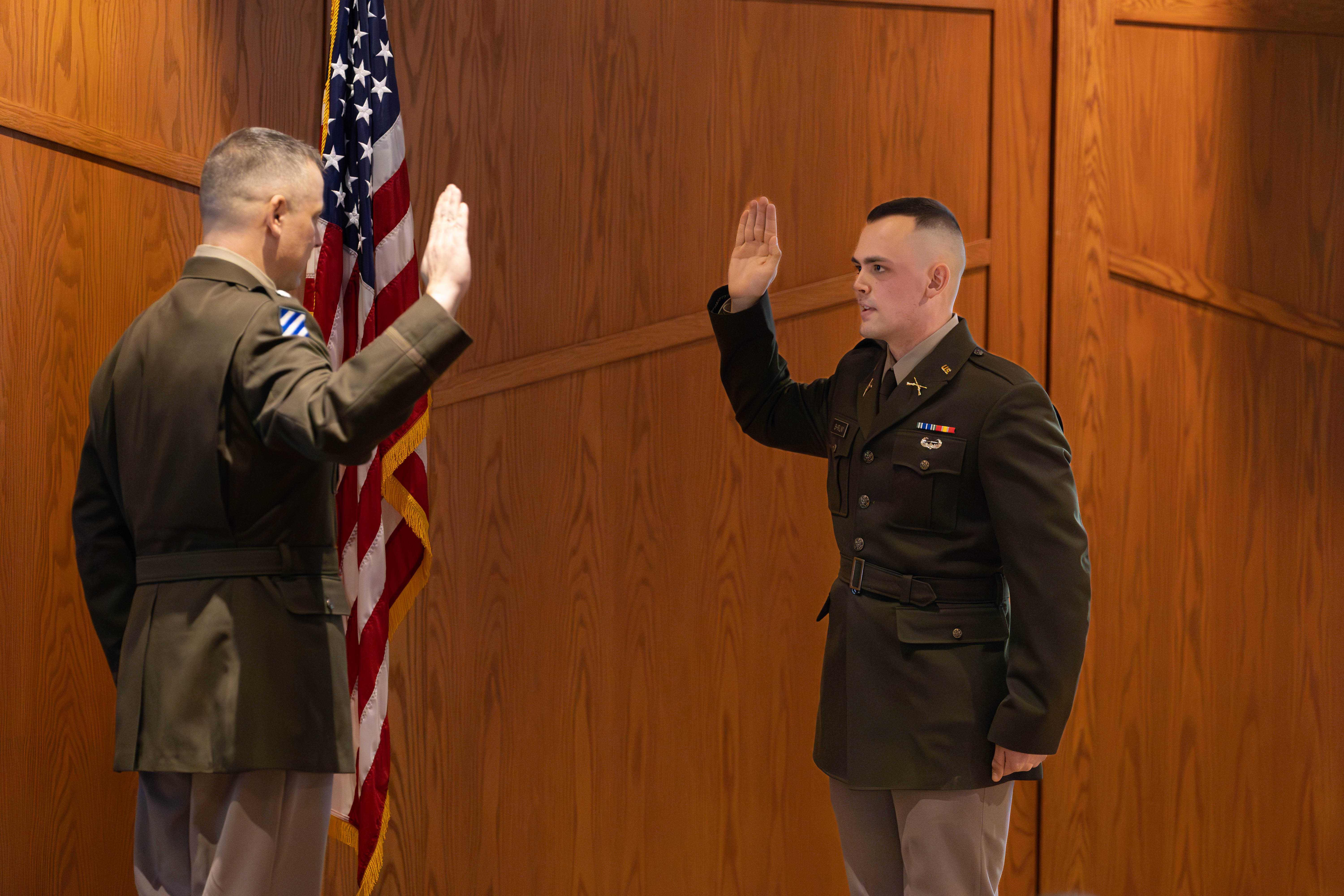 Ltc. Lucas giving the Oath of Commissioned Officer to 2nd Lt. Shrum