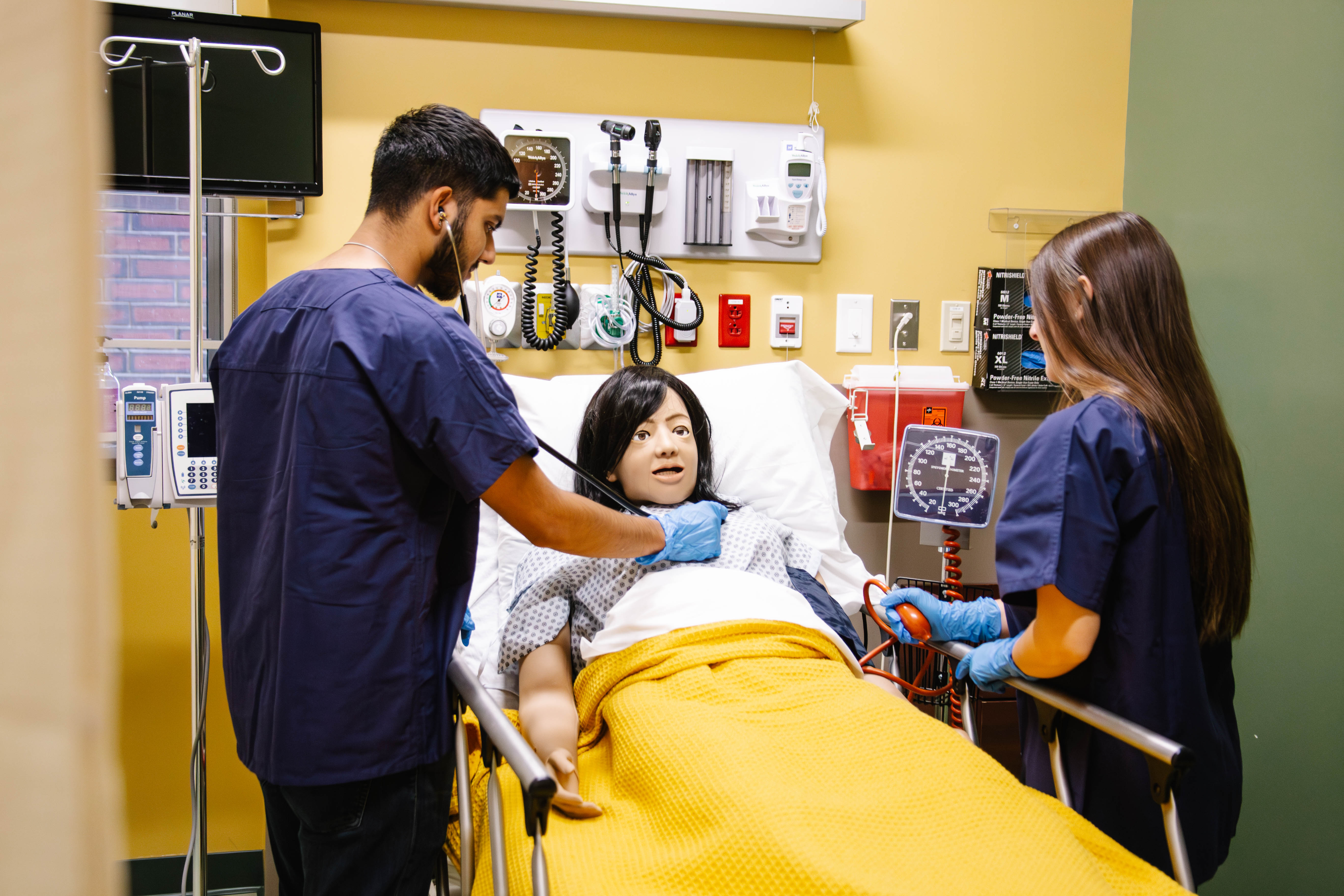 087-SVC-students-in-nursing-sim-lab.png