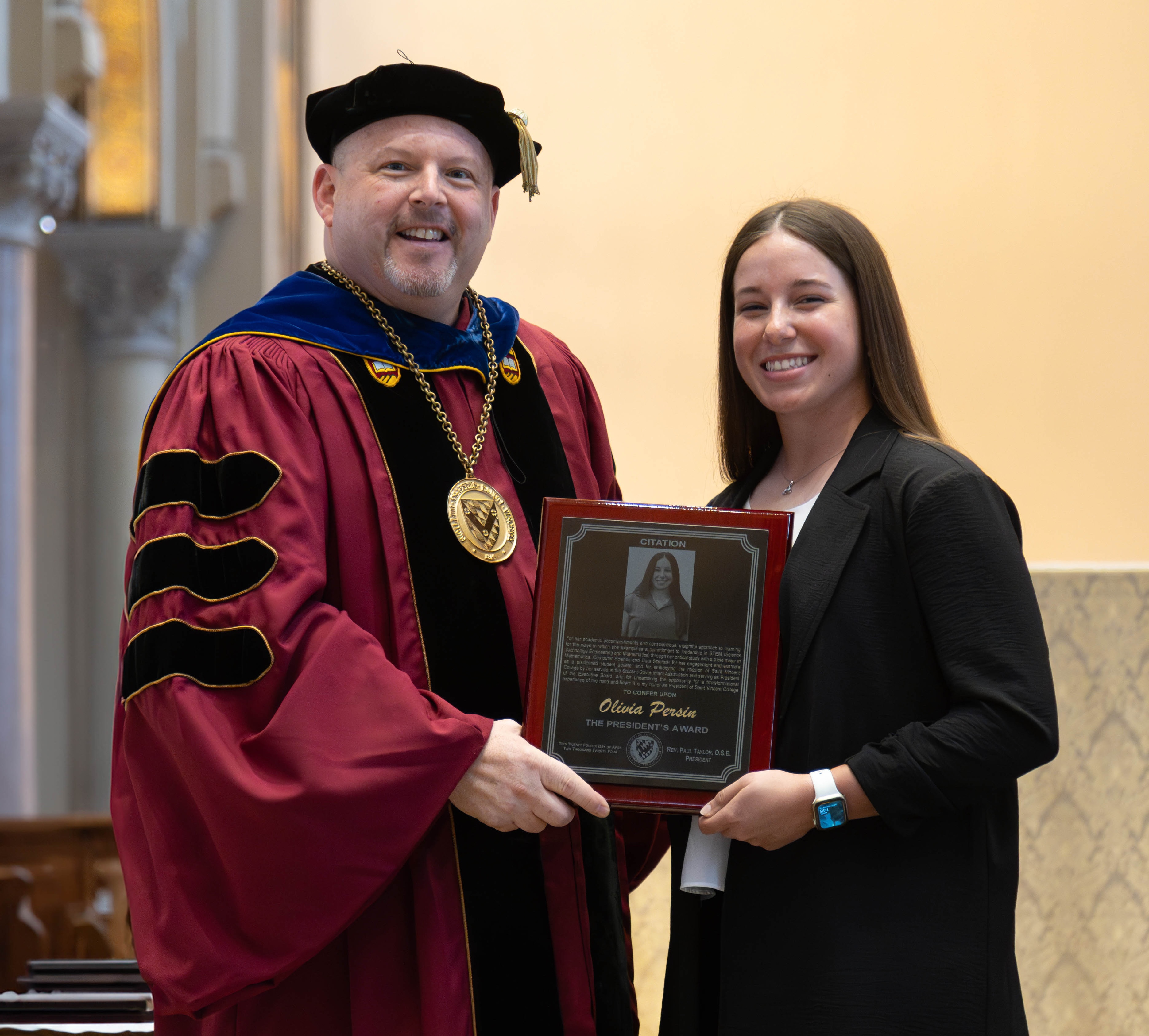 Olivia Persin and Fr. Paul Taylor, O.S.B., president of Saint Vincent