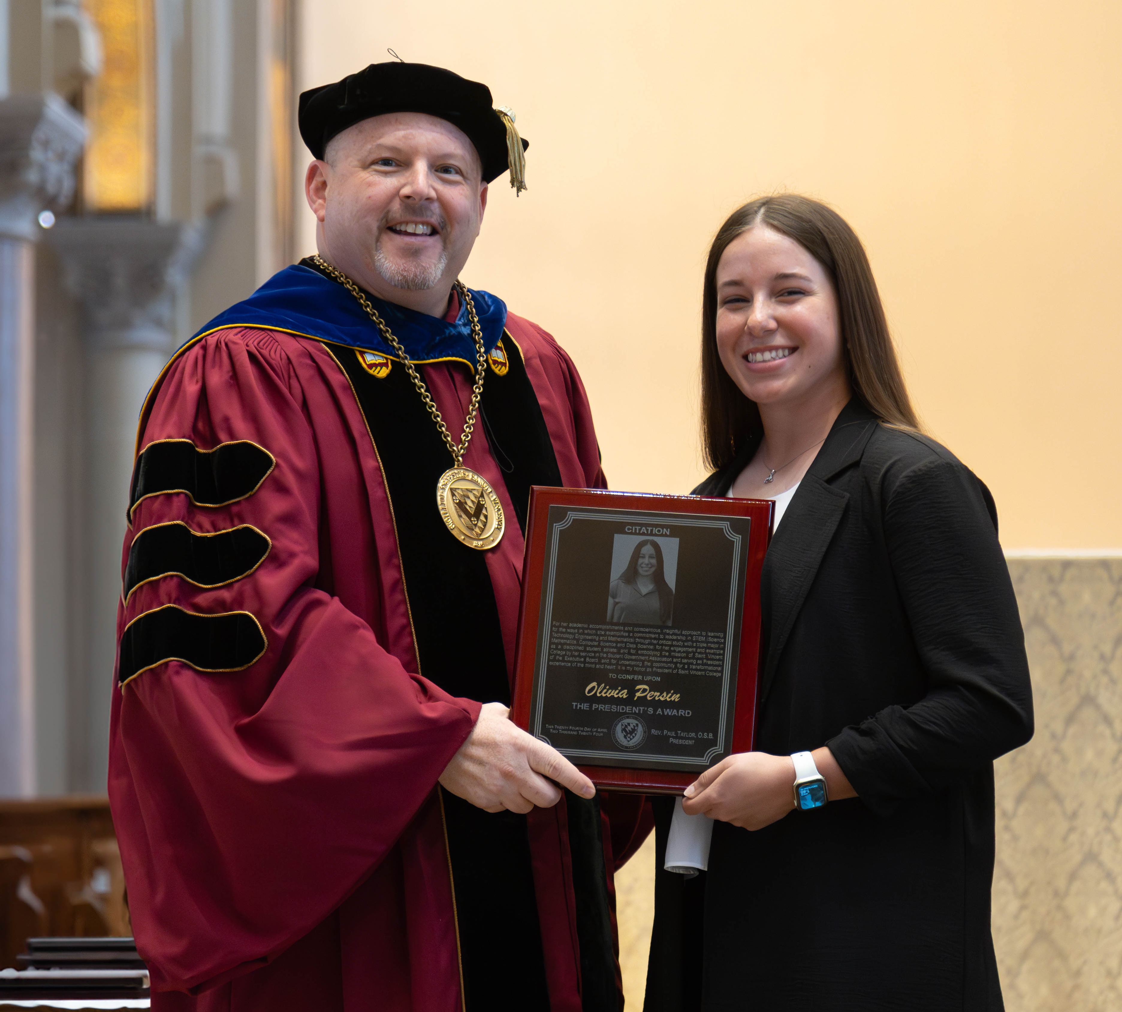  Olivia Persin and Fr. Paul Taylor, O.S.B., president of Saint Vincent